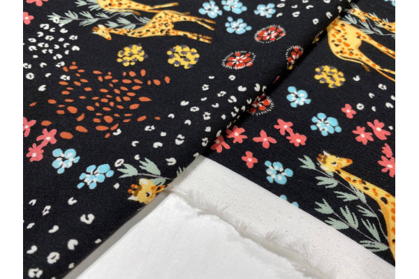 VISCOSE PRINTED ON A BLACK BACKGROUND WITH MULTICOLORED FLORAL MOTIFS AND GOLDEN GIRAFFES   M-01673