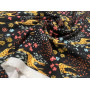VISCOSE PRINTED ON A BLACK BACKGROUND WITH MULTICOLORED FLORAL MOTIFS AND GOLDEN GIRAFFES   M-01673